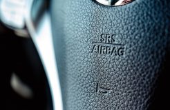 Air Bag sign on a steer wheel in the car. Front air bags.